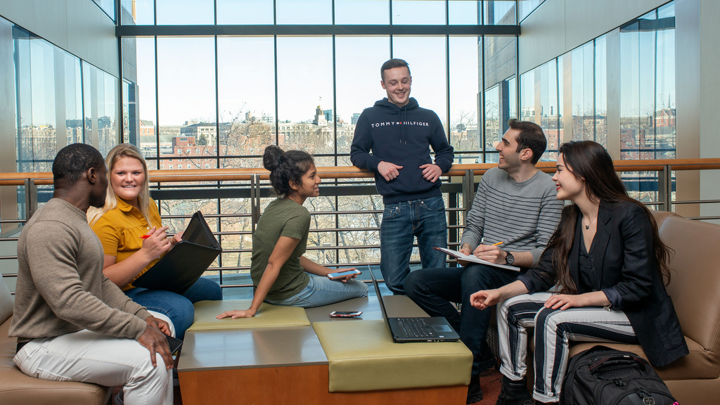 Leadership students meeting in a group setting on campus.